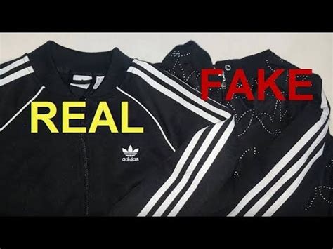 how to spot a fake adidas jacket|real adidas jackets.